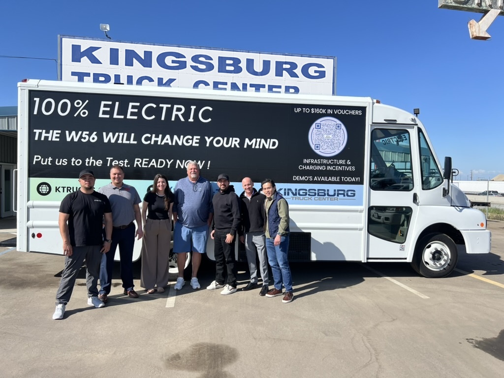 The Kingsburg Truck Center team in front of a Workhorse W56 electric step van at our Kingsburg, California dealership.